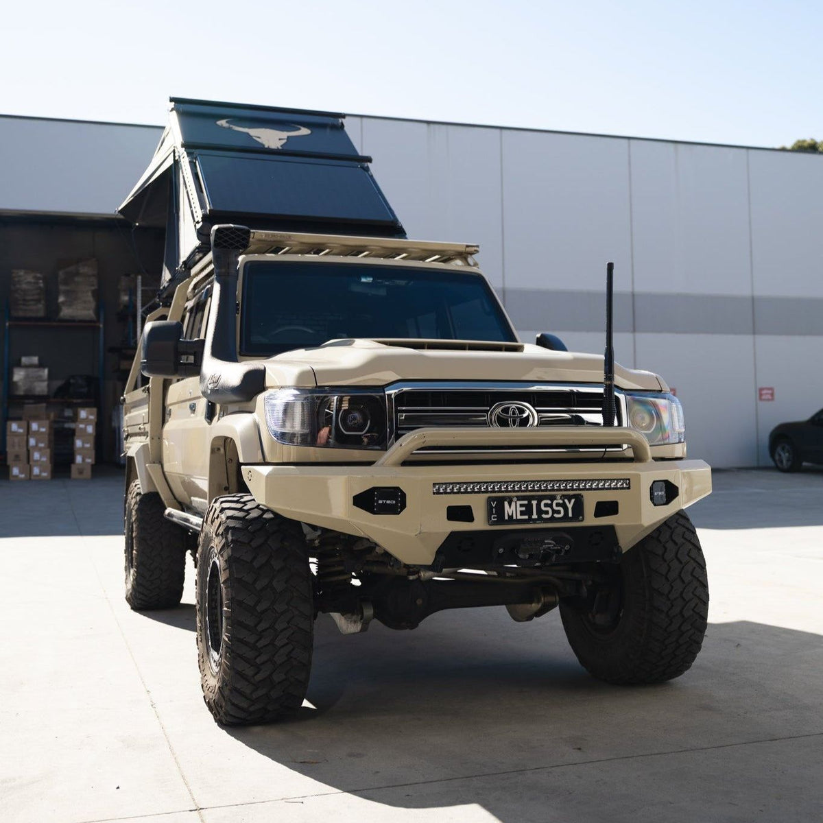 Summit SLV rooftop tent closed on a 4x4 ute roof rack, front view
